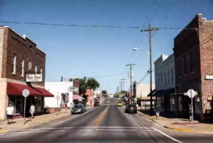 Downtown Shawnee Main Street with people and local businesses