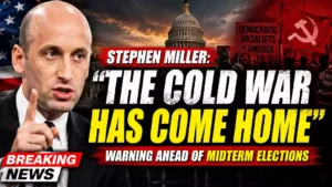 Stephen Miller speaks during a political interview as a YouTube thumbnail highlights his warning that "The Cold War Has Come Home" ahead of the U.S. midterm elections, featuring the U.S. Capitol, American flag, and protest imagery.