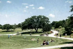 Well-maintained public park in Norman with green open space and visitors