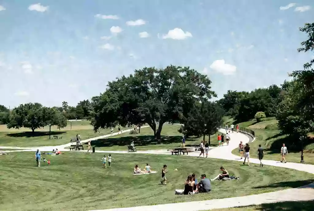 Well-maintained public park in Norman with green open space and visitors