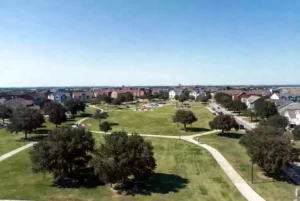 Well-maintained public park in Broken Arrow with green lawns and walking paths