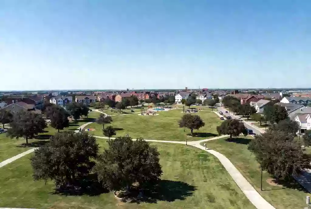 Well-maintained public park in Broken Arrow with green lawns and walking paths