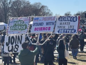 Rally attendees approach the state Capitol during the Stand Up For Science gathering on Mar. 7.
