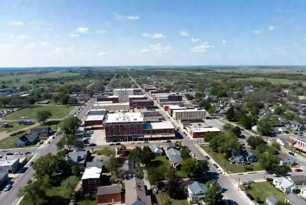 Vertical photo of historic brick buildings along main street in Okmulgee Oklahoma