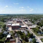 Vertical photo of historic brick buildings along main street in Okmulgee Oklahoma