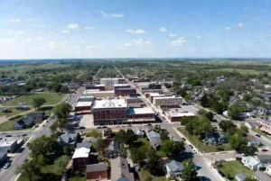 Vertical photo of historic brick buildings along main street in Okmulgee Oklahoma