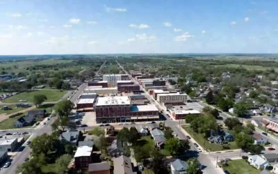 Vertical photo of historic brick buildings along main street in Okmulgee Oklahoma