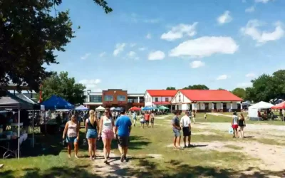 Wide view of a community festival atmosphere with people and open space in Okmulgee Oklahoma