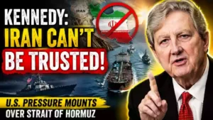 John Kennedy warns Iran cannot be trusted as U.S. pressure mounts over the Strait of Hormuz, featuring a U.S. Navy warship, oil tanker, Iran map, and Kennedy portrait.