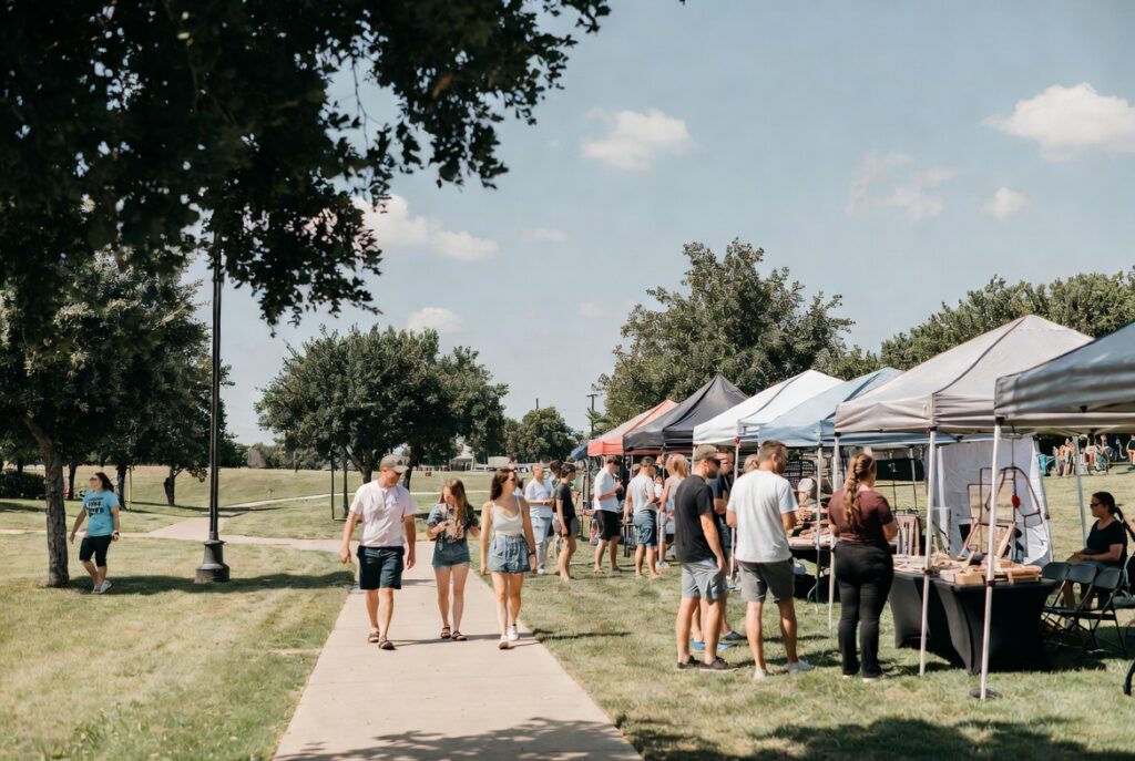 Community festival atmosphere with people and open space in a Bixby park