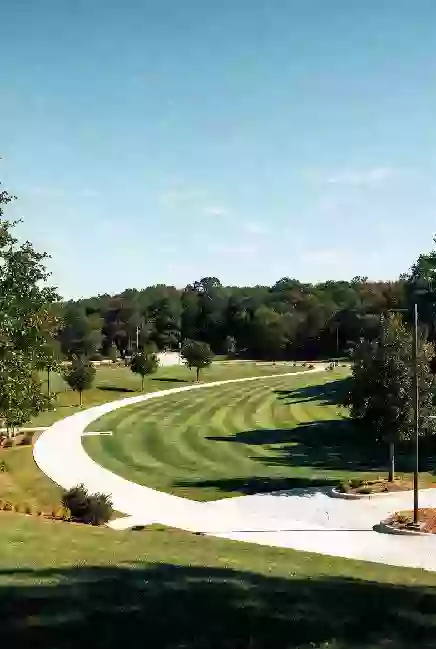 Well-maintained public park with walking paths in Owasso