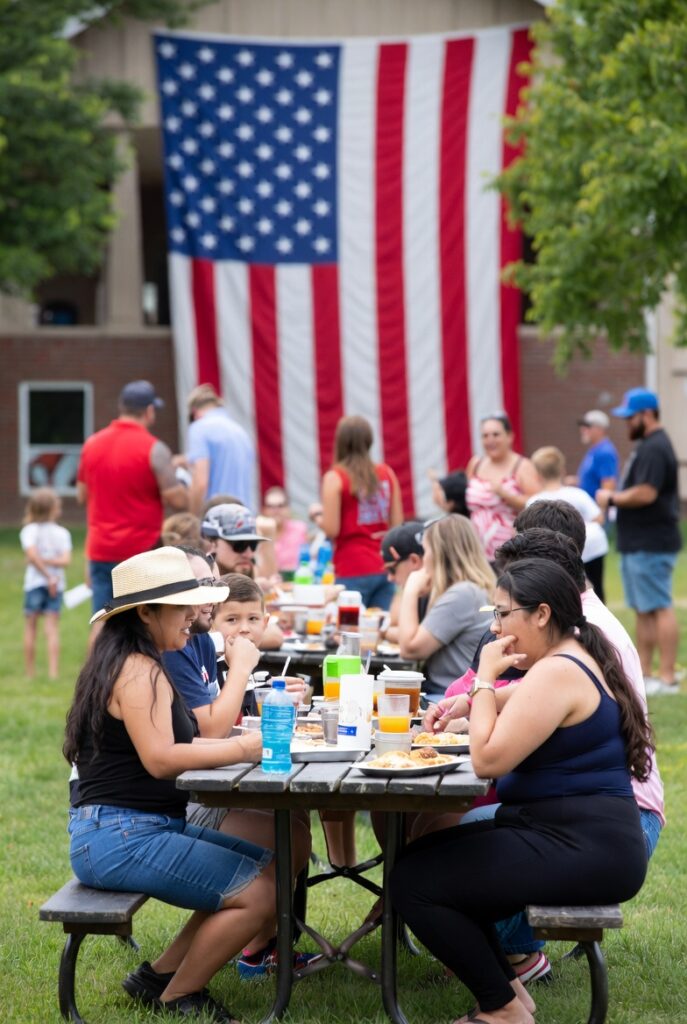 Families enjoying a July 4th patriotic celebration in Weatherford Oklahoma