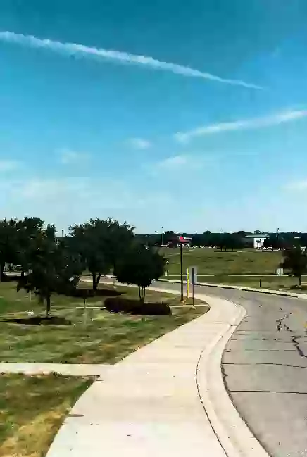 Well-maintained public park with walking paths in Weatherford