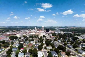 Vertical view of downtown buildings in Bartlesville Oklahoma under clear skies