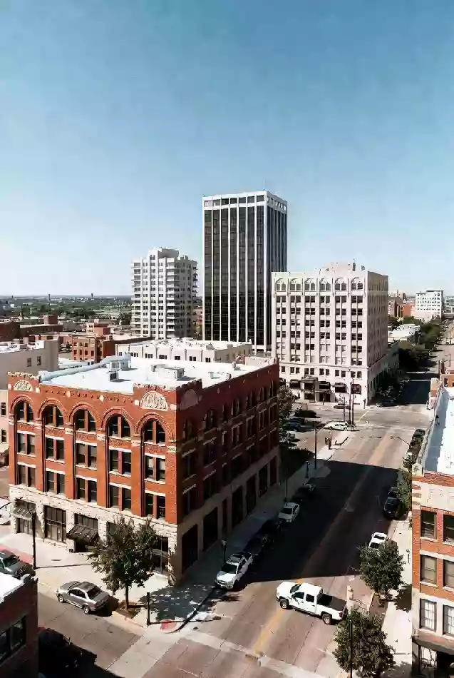 Vertical view of downtown buildings in Bartlesville Oklahoma under clear skies