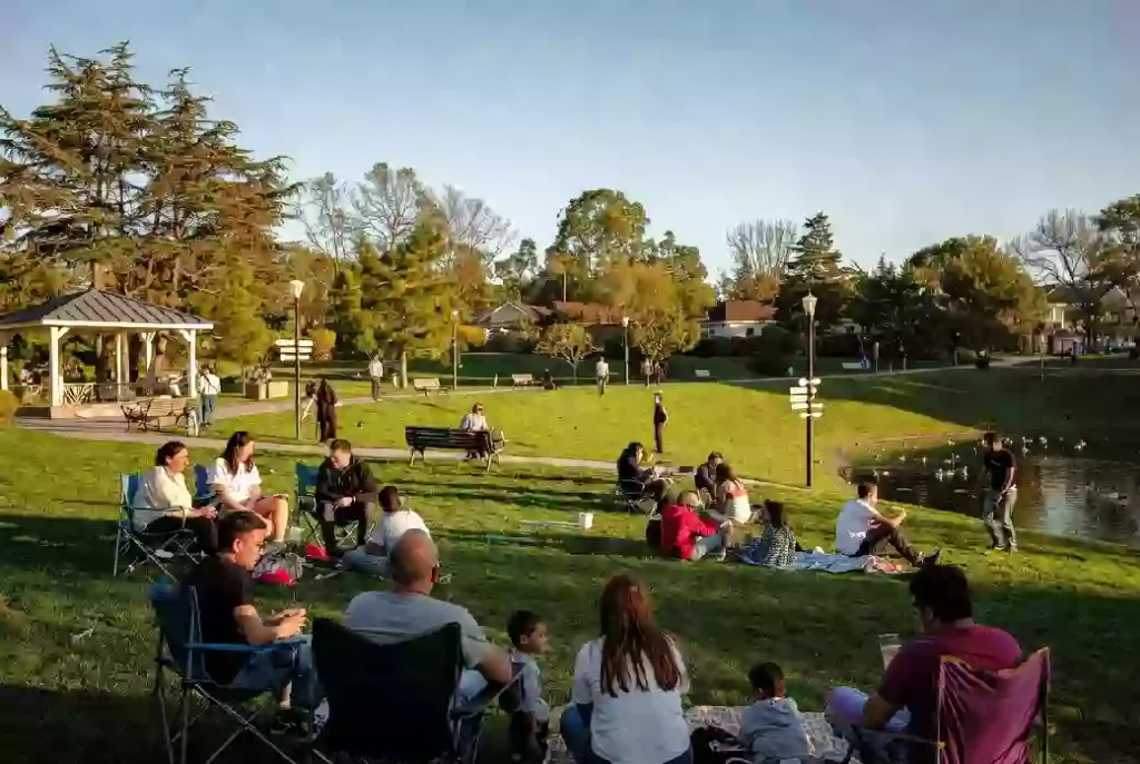 Free outdoor community event with families gathered in a Bartlesville park