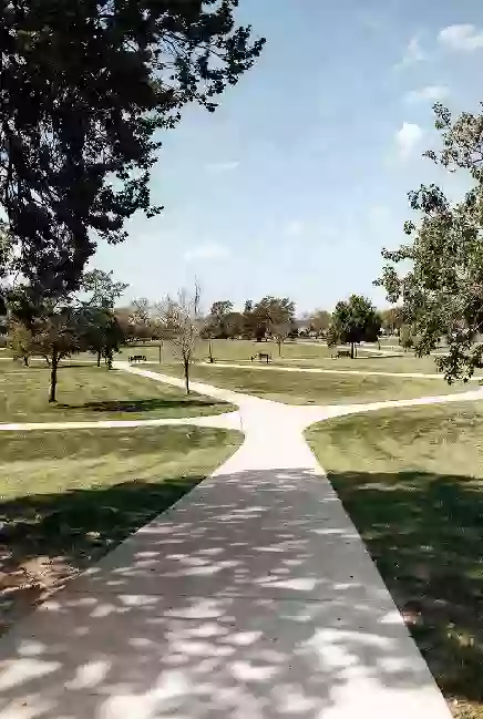 Well-maintained public park with walking paths in Bartlesville