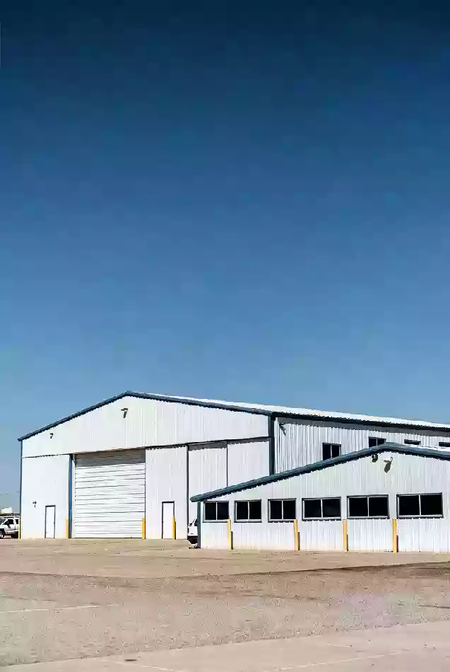 Vertical view of modern airport hangar facilities supporting aviation growth in Custer County Oklahoma
