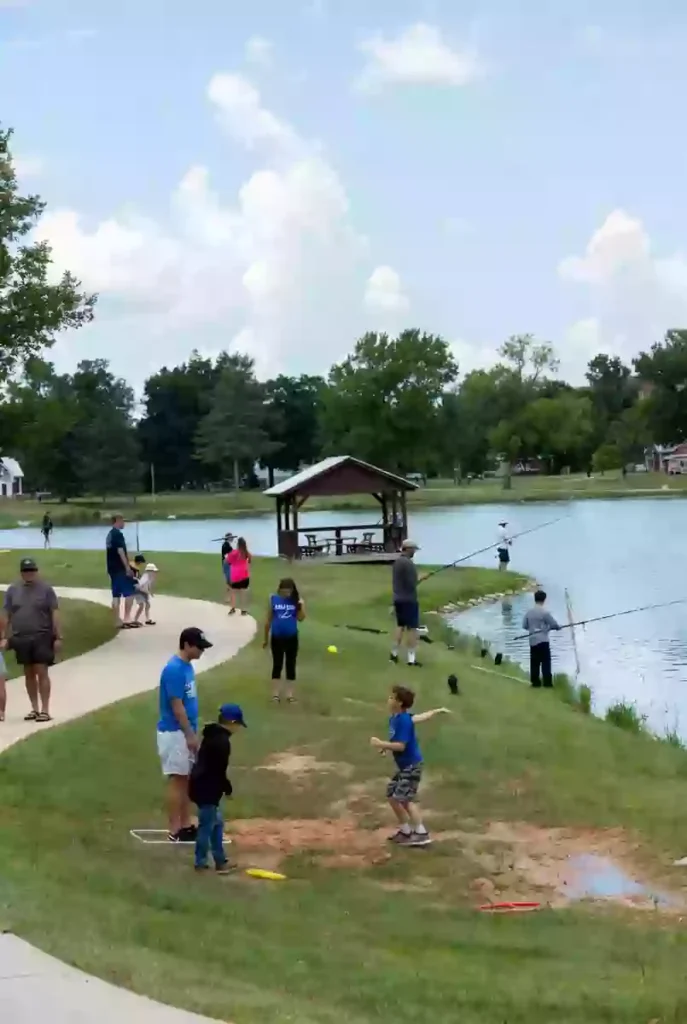 Families enjoying outdoor recreation at a park or lake in Seminole County Oklahoma