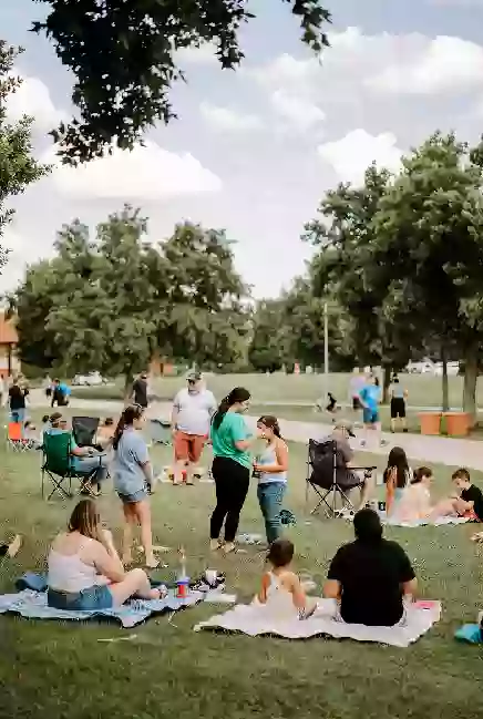 Families at a free outdoor community event or park gathering in Seminole County Oklahoma
