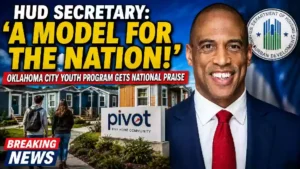 Scott Turner, U.S. Secretary of Housing and Urban Development, poses for an official portrait in a navy suit and red tie.