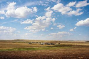 Vast rural landscape in Texas County Oklahoma Panhandle with farmland and open skies on a sunny day