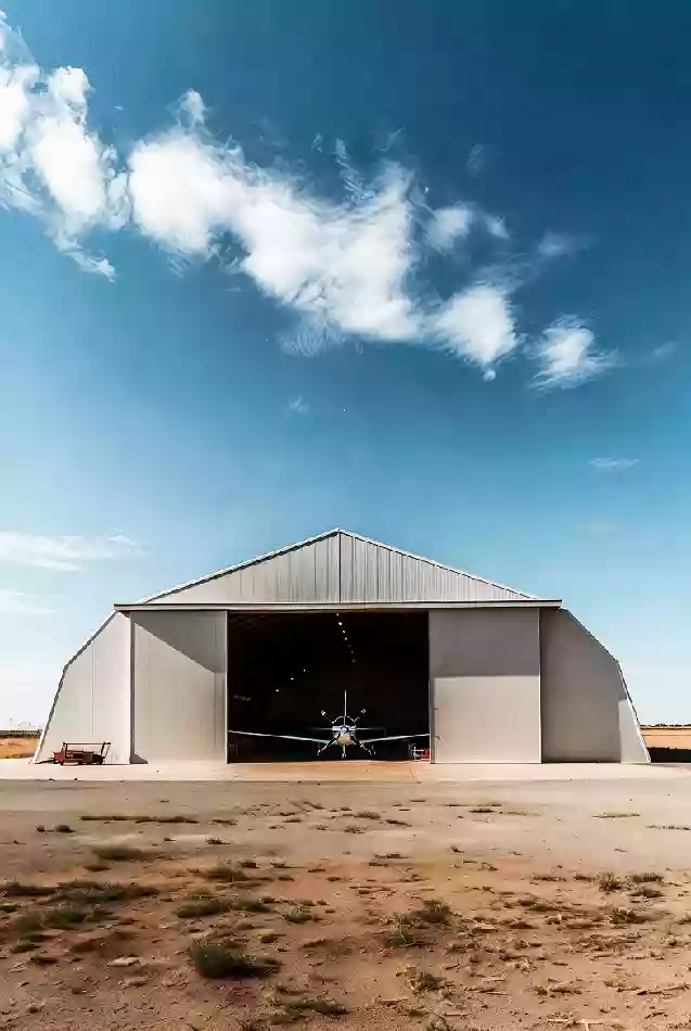 Vertical photo of a new aircraft hangar at Guymon Municipal Airport in Texas County Oklahoma