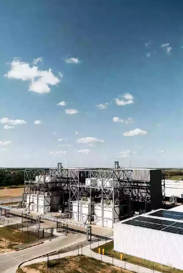 Vertical view of modern energy storage and utility infrastructure supporting growth in Bryan County Oklahoma