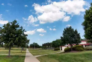 Well-maintained public park with green lawns and walking paths