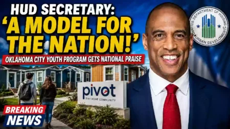 Scott Turner, U.S. Secretary of Housing and Urban Development, poses for an official portrait in a navy suit and red tie.