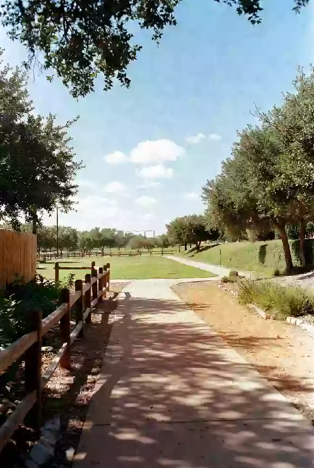 Well-maintained public park with walking paths