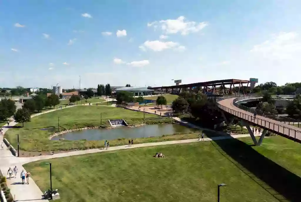 Gathering Place with open green space and visitors
